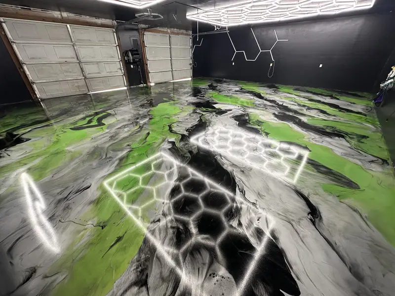 Green and silver metallic epoxy garage floor